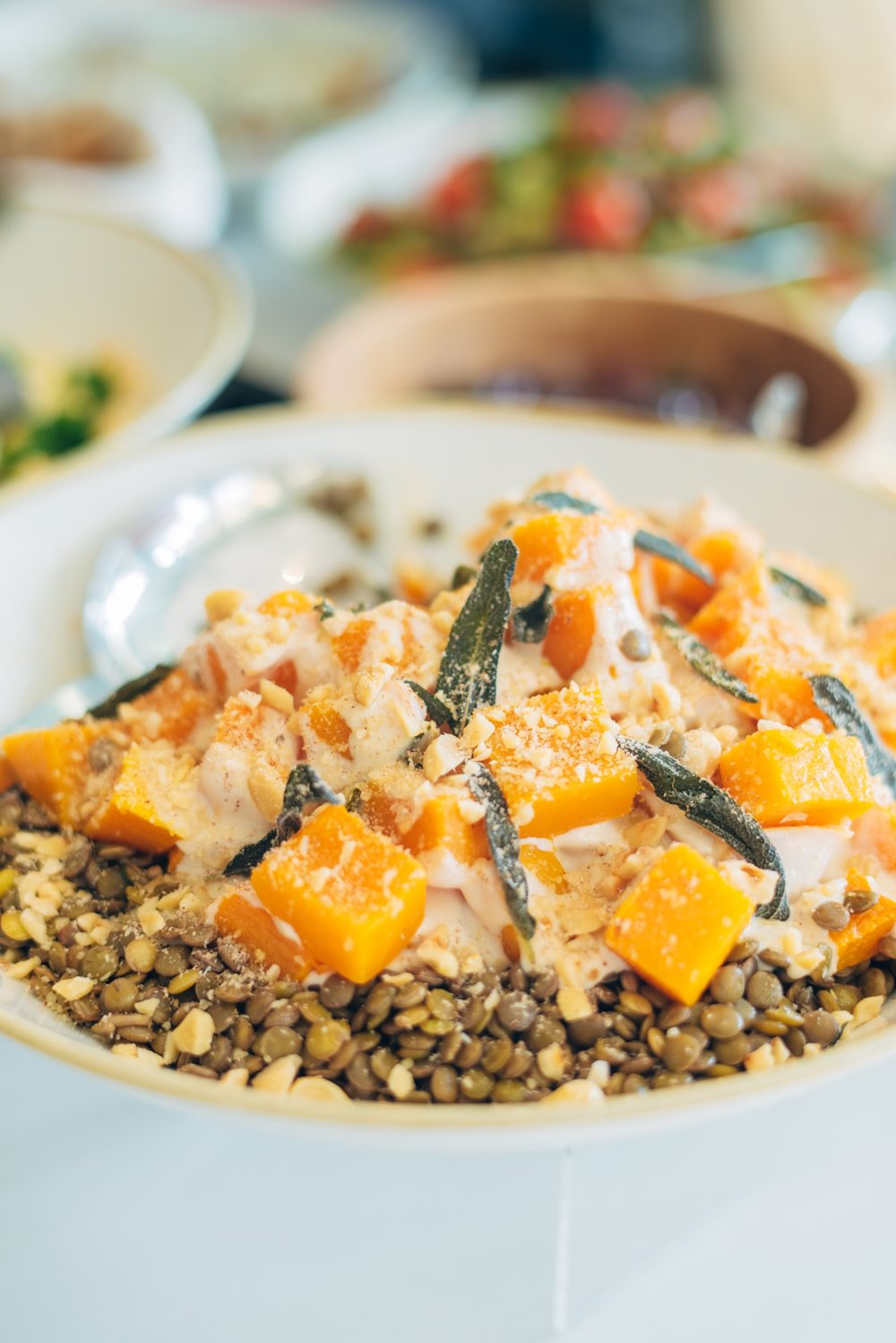A bowl of roasted butternut squash with lentils, sage and hazelnuts at Fika's deli counter